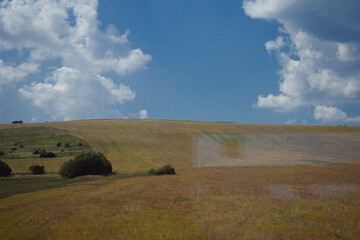 landscape with bales and sky