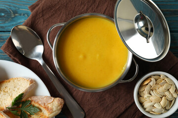 Concept of tasty food with pumpkin soup, top view