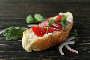 Delicious italian snack bruschetta on rustic wooden background