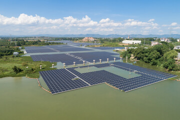 Aerial photo of photovoltaic solar power panels on the water