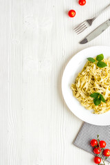 Italian pasta fettuccine with cream sauce and herbs