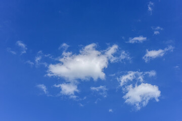 Beautiful white clouds on blue sky background.