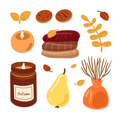 Autumn set with sweaters, candles, cakes, pear, vase, and leaves