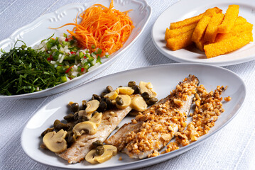 Smoked trout with capers and mushrooms and smoked trout with almonds and salad