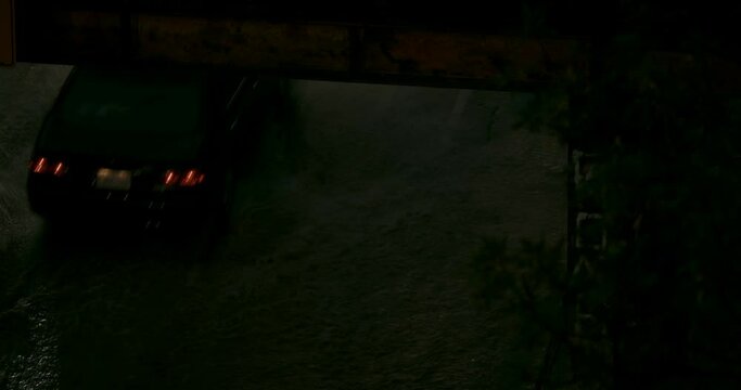 Car traffic during severe flooding.