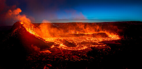 Looking at the lavaflow from the erupting volcanic crater of Geldingadalagos eruption in Reykjanes peninsula, Iceland.