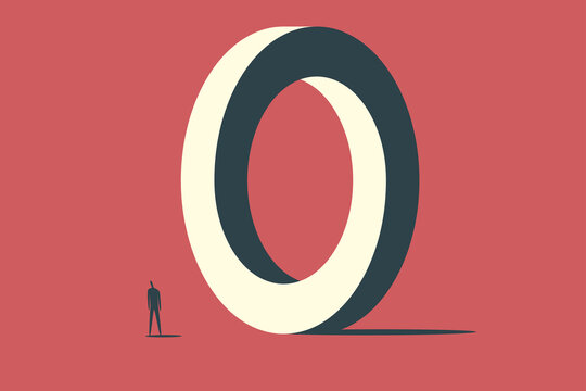 Man standing near to giant impossible circle.