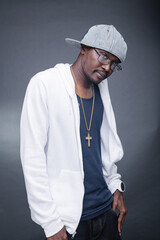 Young man offers a variety of poses and attitudes during a studio photo session