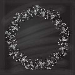 Vector autumn leaves frame on a chalkboard background.