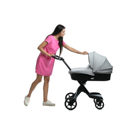 Happy young woman with baby stroller on white background