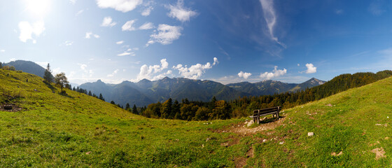 Bench in front of panorama of Mountain Geiglstein, Schleching, Chiemgau, Bavaria