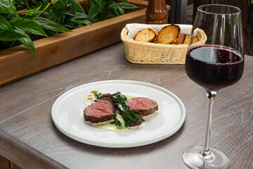 steak with a glass of red wine