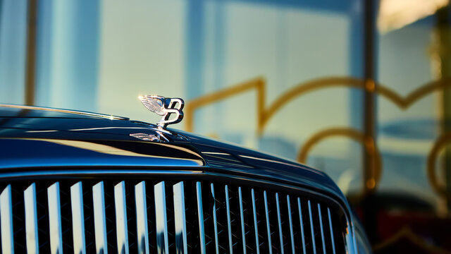 Kyiv, Ukraine - October 02, 2019: Bentley logo on the hood of Mulsanne. Mulsanne - launched in 2010 - is the only model of Bentley, carrying the Flying B distinctive hood ornament.