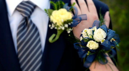 Date Prom Flowers Formal Wear Corsage Hand on Shoulder selective focus blur - obrazy, fototapety, plakaty