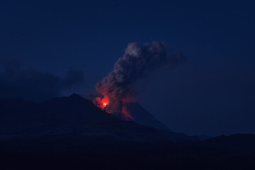 The eruption of the Shiveluch volcano on the Kamchatka Peninsula, Russia. Summer night landscape...