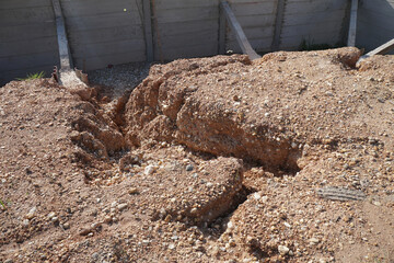 Soil erosion caused by heavy rains on construction sites. construction problems caused by natural disasters.
