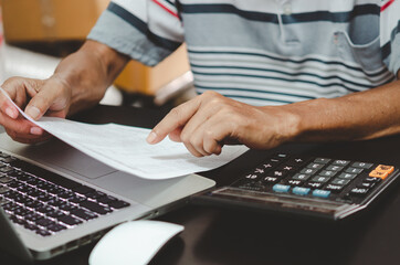 Fototapeta na wymiar financial business documents tax marketing and computer keyboard and calculator on desk