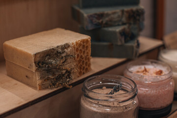 Handmade natural soap on wooden background. Spa natural treatments. Organic natural soap for spa and wellness products.