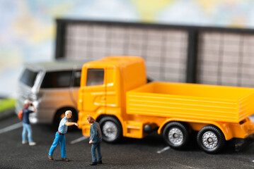 Miniature people aggrieved party dispute car accident in public road street using for Car Automotive maintenance repair fixed or replacement Service or Vehicle Insurance guarantee or drive safety