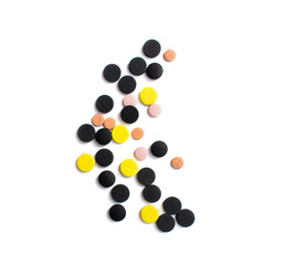 Pills. Multi-colored pills on an isolated white background. Healthcare and medicine.