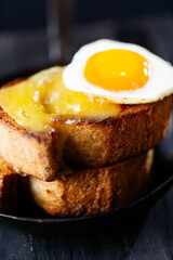 rustic french cheese toast with egg croque madame