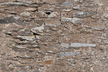 Texture of a stone wall. Old castle stone wall texture background. Stone wall as a background or texture. Part of a stone wall, for background or texture
