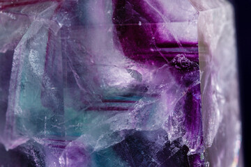 Macro mineral stone Fluorite crystal on a black background