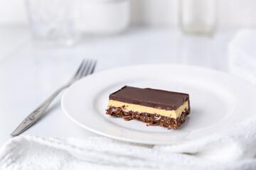 A plate with a Nanaimo bar - a traditional Canadian dessert