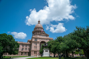 Fototapeta na wymiar View of the Austin Texas State Capitol Building during the Day Time with Clouds in the Sky