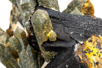 Macro mineral stone Quartz Hedenbergite Prase on ilvite on a white background