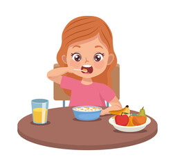 little girl eating breakfast