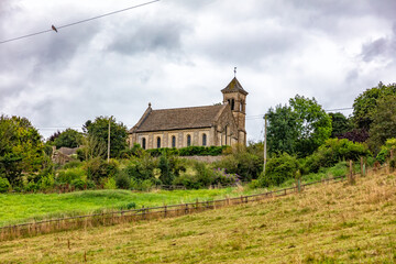 Fototapeta na wymiar 19th century St Luke's Church in Frampton Mansell, The Cotswolds, England, United Kingdom