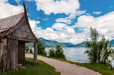 Wooden house on the lake. Viking village at the Lake Walchensee. upper Bavaria, Bavarian prealps,...