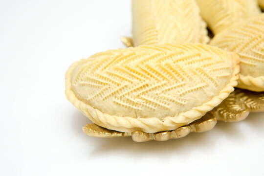 Shekerbura as Novruz symbol.Azerbaijani sweetness in the form of small cakes made of yeast dough, with a pattern on the surface and a filling of ground hazelnuts, sugar and cardamom