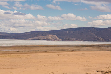 A sandy beach on the bank of the Yenisei River.Russia, Republic of Khakassia