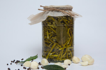 canned vegetables in glass pots jars isolated on a white background an ecological natural food resource for the winter