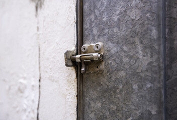 Metal bolt on an old door