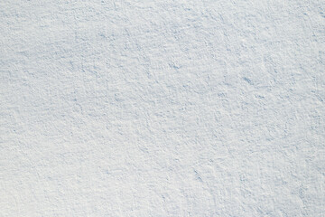 The texture of the field covered with snow. Aerial view