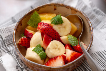 Bowl of Strawberry, banana and Mint Fruit Salad