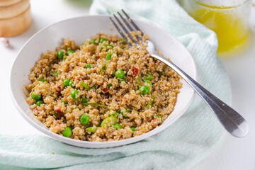 Quinoa Bowl with Peas and Tomatoes