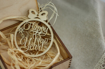 Wooden Christmas tree decoration for the New Year. Ecofriendly Christmas. New Year in a rustic style.