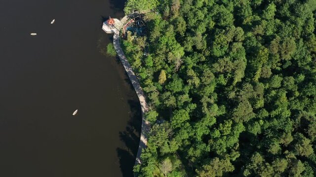 European city with park. Aerial view from drone on Svetlogorsk town and Tikhoe lake