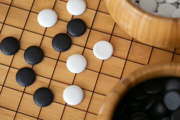 Close-up of Go Board Game Pieces