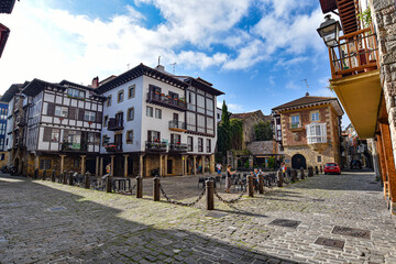 Hondarribia, Spain - 29 Aug 2021: Traditional Basque houses in the Plaza Gipuzkoa in old town...