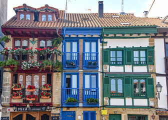 Hondarribia, Spain - 29 Aug 2021: Traditional Basque houses in the cobble stone streets of old town...