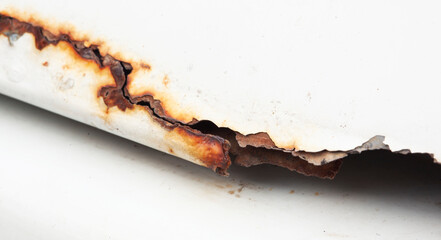 Naklejka premium rust is slowly eating up the car. Macro view