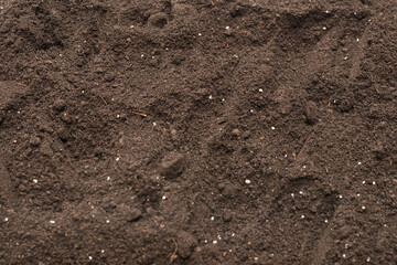 Black land for plant background. Top view.