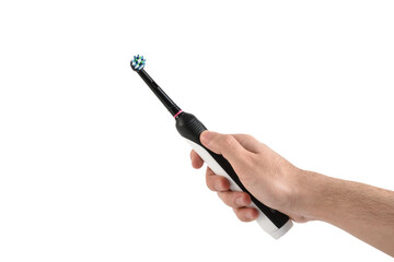 Hand holding electric toothbrush on white background with clipping path