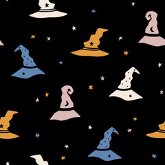 Hand drawn Halloween seamless vector pattern with witch hats and stars. Cute spooky background for Halloween party and autumn holidays. Trendy vector background. Flat style, kids illustration
