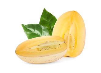 Halves of fresh ripe pepino melon and green leaves on white background